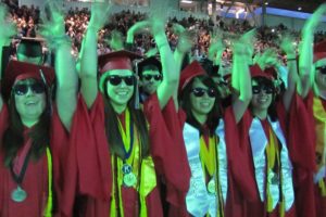 After CHS graduates moved the tassels on their caps from right to left, each student donned a pair of sunglasses and danced to "Forever," by Chris Brown. At the song's conclusion, many of the graduates threw their caps into the air at Doc Harris Stadium.