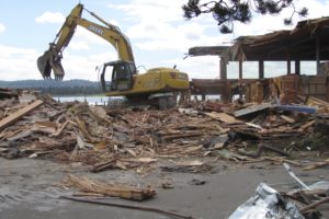 Onlookers watched as the Parker House Restaurant building was demolished last week. Metal and wood materials were sorted by crews with Nutter Corporation, for recycling or reusing purposes. RSV Building Solutions is expected to break ground within 30 days for the Black Pearl on the Columbia, at the former Parker House site. The two-story restaurant is expected to open next spring.