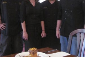 Executive Chef Rudy Garcia, Server Melanie Harold, Sous Chef Antonio Hernandez and Sous Chef-in Training Greg Shelby Jr. (left to right) have joined the staff at Shelby's Restaurant & Lounge, in Washougal. Menu choices include risotto cakes and colossal sea scallops pan seared with three sauces. A grand re-opening, to celebrate Garcia's arrival and the completion of renovations, will be held today through Sunday. Future plans include the addition of windows in the main dining area and a covered deck.