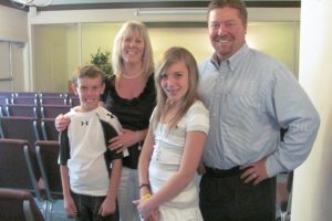 Wendi and Chris Dierickx and their children Dalton and Ashton, stand in the chapel at Straub's Funeral Home. The business is celebrating its 100th anniversary in downtown Camas. "It is quite a milestone," Chris said. "It's a testament to the service we provide to the local communities and the trust that families have in Straub's Funeral Home."