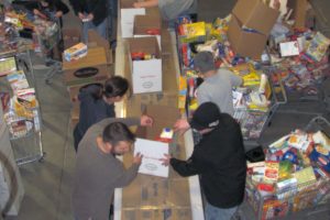 The Camas Fire Department's Grass Valley fire station was bustling Wednesday as employees from the CFD, as well as the Washougal Fire Department, East County Fire and Rescue, and the local community helped finish boxing up food and toys that were delivered later that day.  Through the Christmas Activities Relief Organization Limited program, area fire departments have been reaching out to local families in need for more than 50 years.