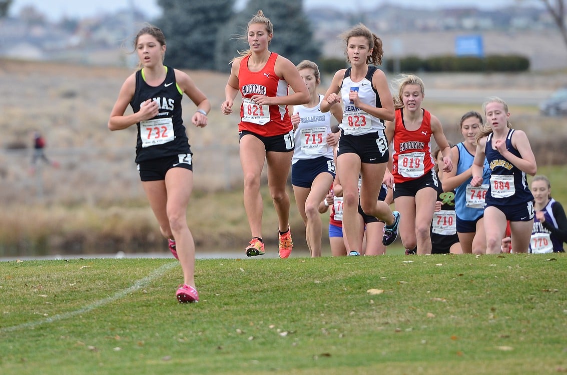 Maddie Woodson crests the hill.
