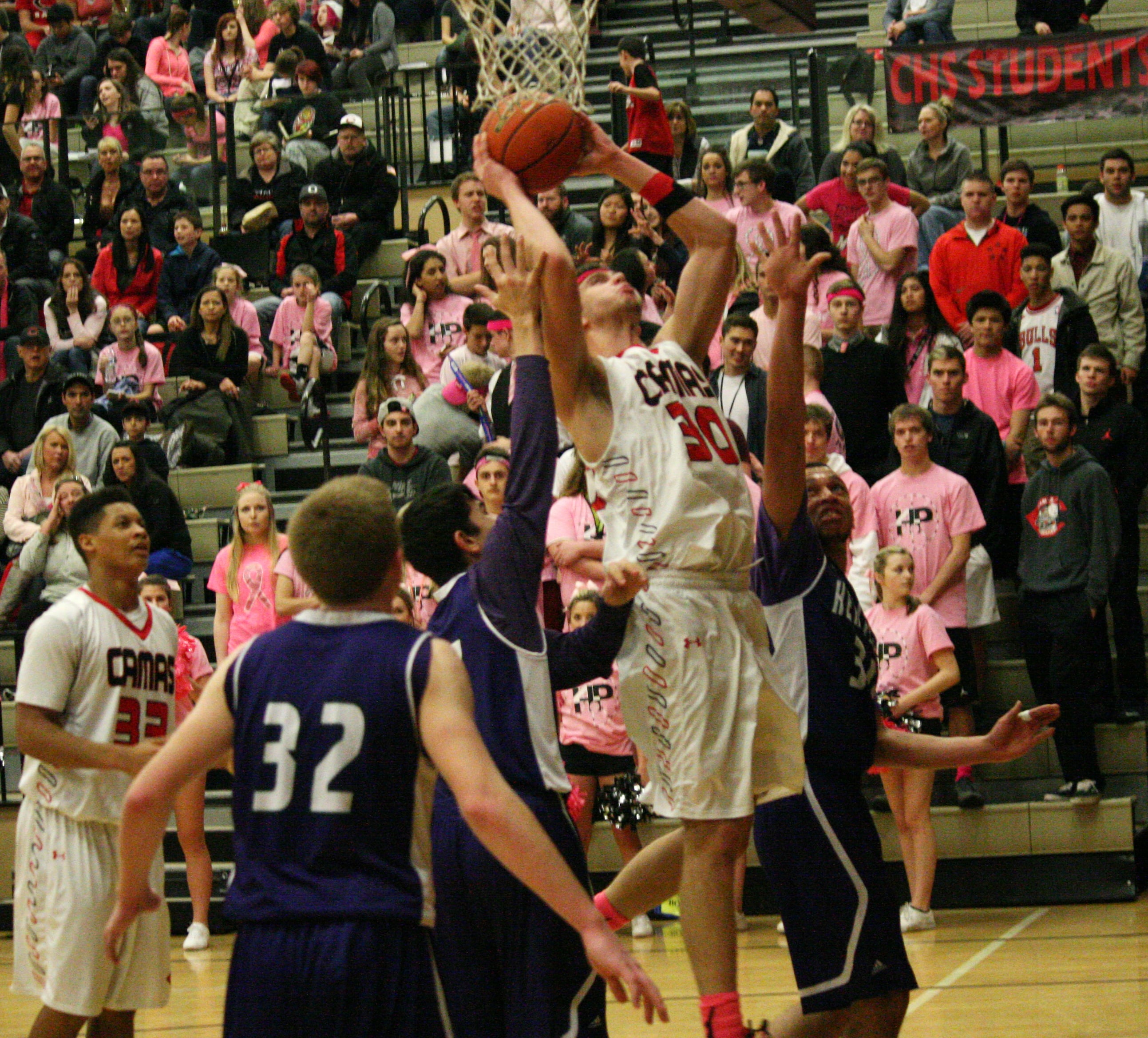 Trevor Jasinsky weaves a basket.
