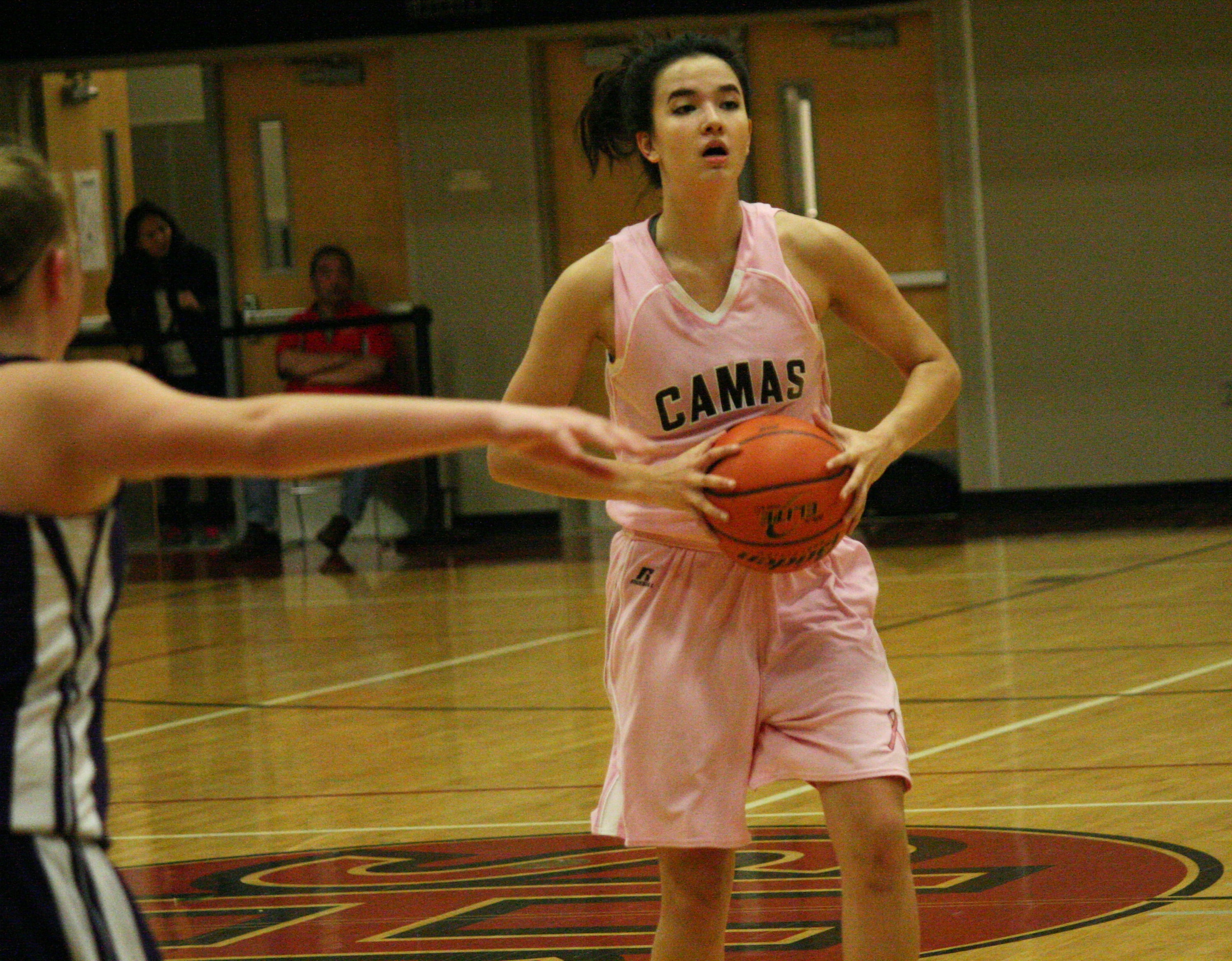 Brenna Khaw chucks a pass.