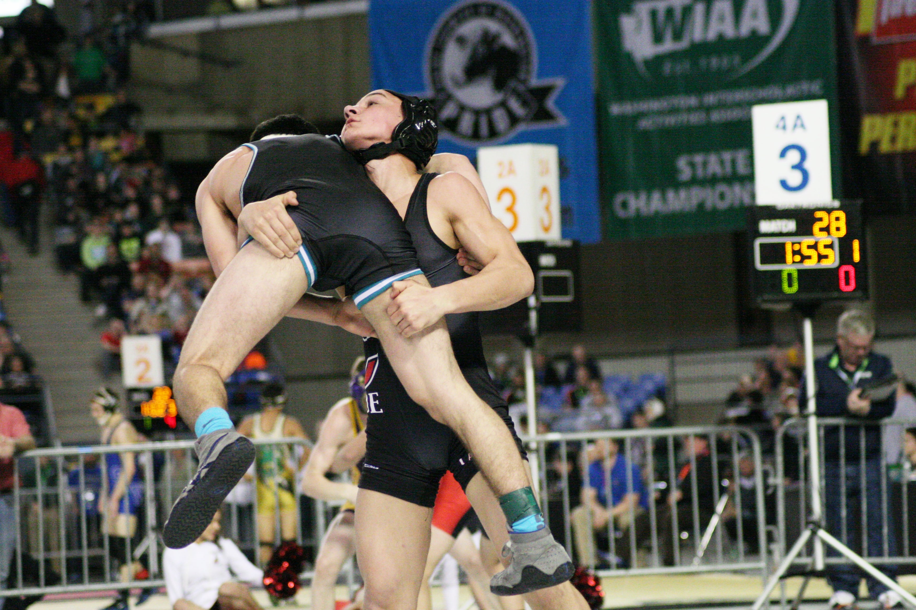 Rylan Thompson picks his opponent up for a slam.