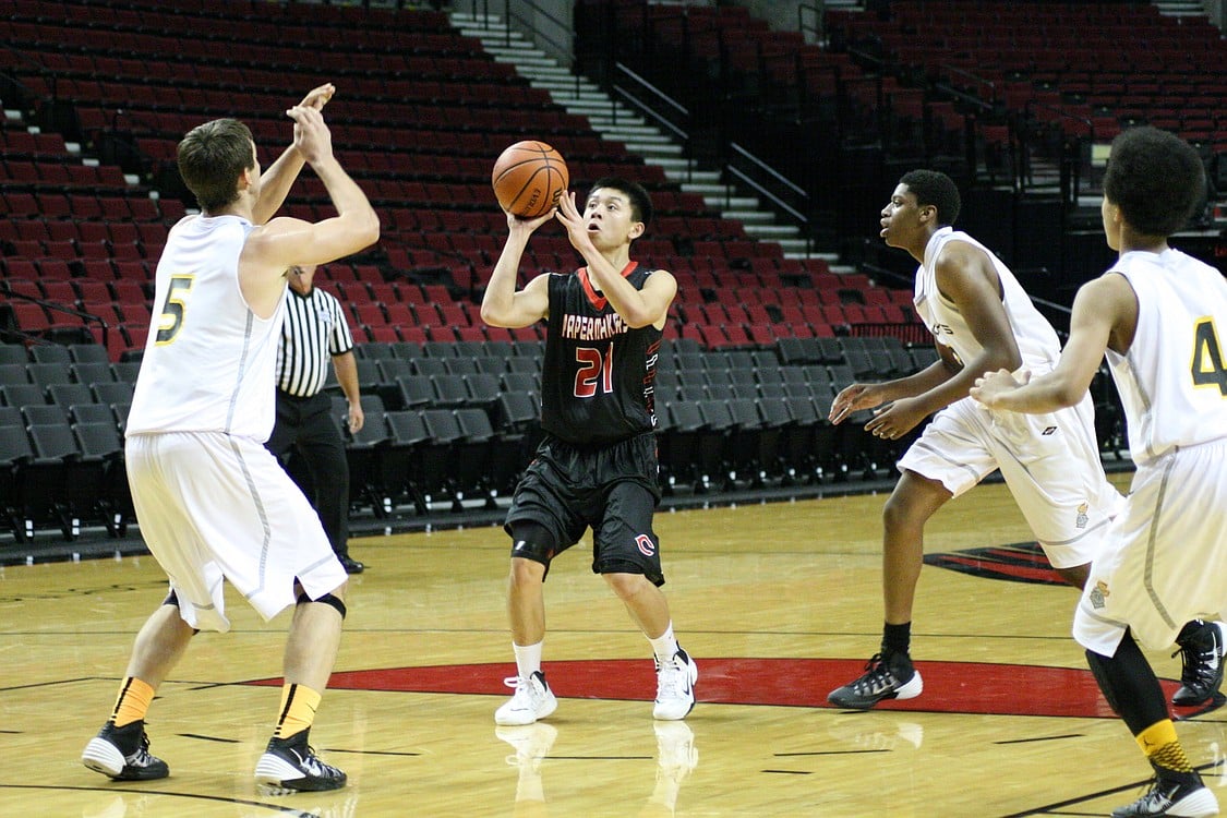 Brandon Nguyen takes a jump shot from the paint.