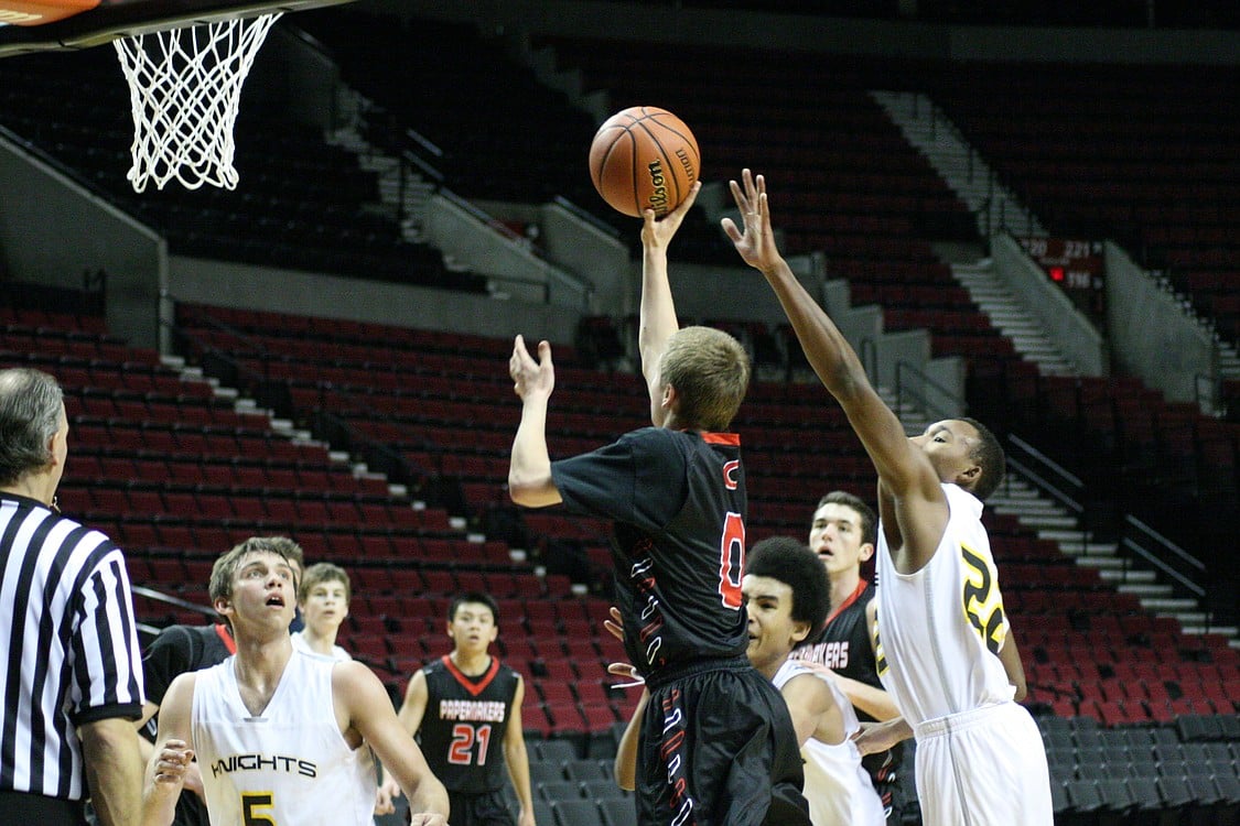 Jake Hansel takes a shot at the net.