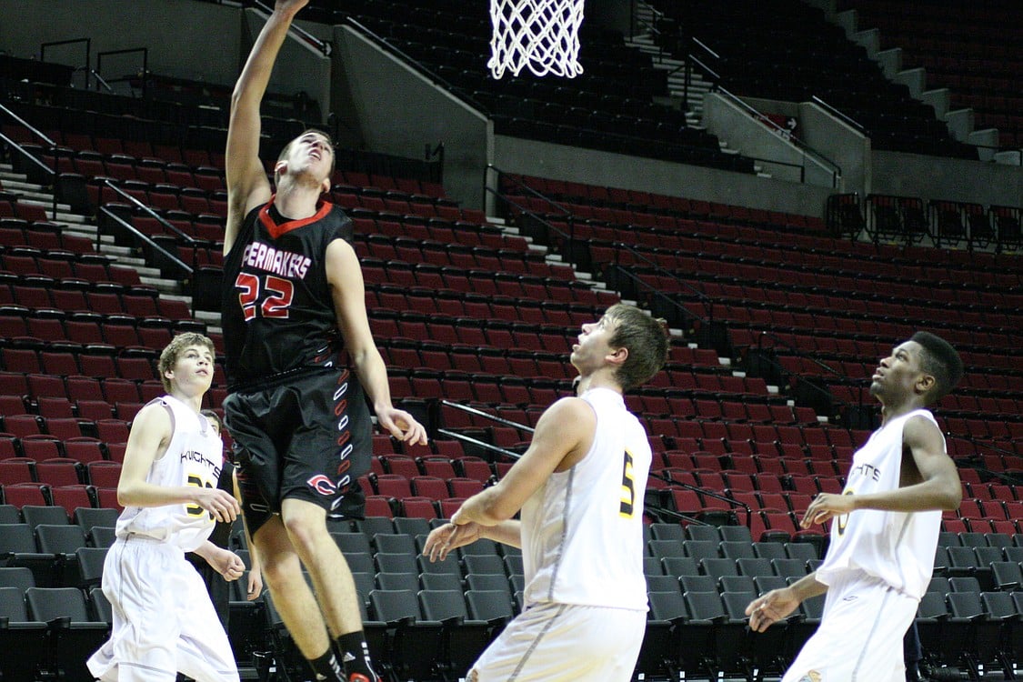 Jordan Lenard puts the ball off the glass and watches it drop through the hoop for two points.