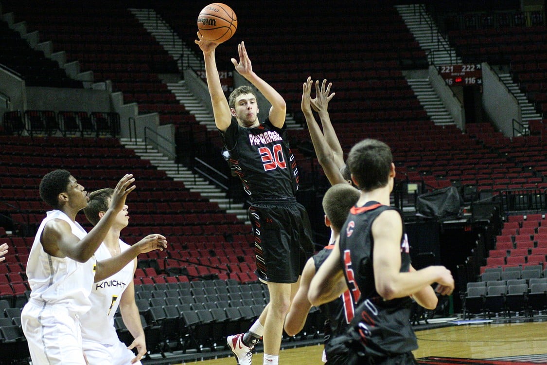 Trevor Jasinsky passes the ball to a teammate.