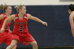 Camas High School seniors and twin sisters McKenna and Paige Jackson (left to right) like to keep their opponents second guessing on the basketball court.