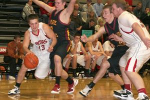 Anthony Fallin (13) curls around a Prairie defender Saturday, at Camas. Fallin finished with 15 points.