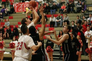Trevor Jasinsky tries to keep a frantic fourth quarter comeback alive for the Papermaker boys basketball team. Camas lost to Skyview by two points and then fell to Evergreen in overtime.