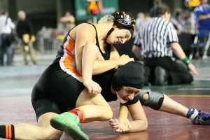 Sara Sanchez (left) lassoed a fifth place state medal from the Mat Classic Saturday, at the Tacoma Dome. The Washougal High School junior rallied back from two losses to defeat Mabton's Jazmin Mendoza 15-2 in her last match.