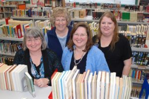 Contributed photo
Washougal elementary school librarians are happiest when surrounded by books. They are (back row, left to right): Marlene Leifsen and Tammy Asbjornsen, (front row, left to right): Holly Vonderohe and Kathy Stanton.