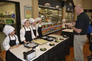 Abby Pearson, Emma Gorham, Josh McGuire and Grace Christensen have their creations judged at the annual Future Chefs Culinary Contest at Washougal High School.
