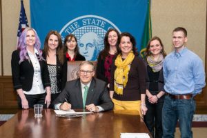 Gov. Jay Inslee signed Substitute Senate Bill No. 6069, relating to community custody conditions for sex offenders, on  March 17. The bill was sponsored by Sen. Ann Rivers, after she was contacted by Camas sisters Kimberly Abell and Jennifer Chilton. Pictured above at the signing are Abell, Chilton, Tamara Linder (session intern), Gov. Inslee, Liz Coleman (legislative assistant), Sen. Rivers, Kelly Ficker (session aide) and John Benson.