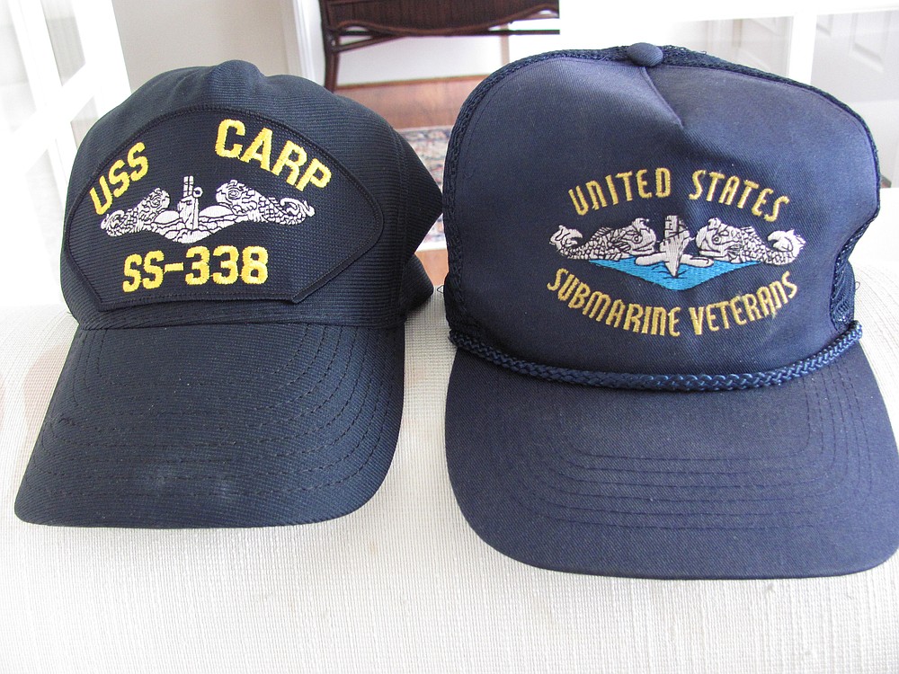 When Jerry Barber wears either of these hats, people ask him about submarines. He was on the USS Carp for 2   years, followed by almost six months on a nuclear-powered submarine, the Robert E. Lee. Barber, 74, is the oldest veteran involved in an exhibit at the Clark County Historical Museum. "Most of them have more tattoos than I do," he said.