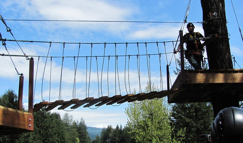 Large describes the sixth zip line in the tour, which takes riders on a steep plunge before slowing and coming to a stop approximately 900 feet later. It is located at the fifth hole of Skamania Lodge's golf course.