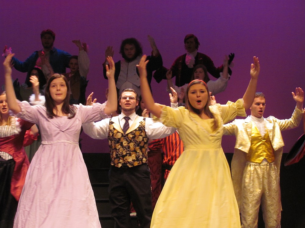 Revelers at the Masquerade dance make the most of the night. From left are Keira Stogin, Savannah McHolland, Jacob Lively, Danielle DeVall and Mac Wright.