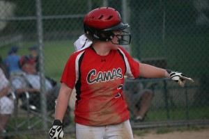 Hannah Welborn points to Katie Schroeder after scoring a big run for the Camas softball team in the seventh inning. The Papermakers defeated Union 6-4 for the district championship Thursday, at Heritage High School.