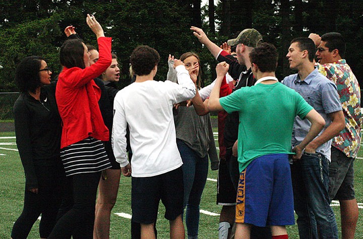 The Papermakers come together for a team cheer after a recent practice. The competitive Unified Soccer team made it to state in its first year of participating in the program.