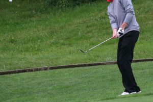 Brian Humphreys chips on to the ninth green during the final round of the 4A state boys golf tournament at Camas Meadows. The CHS sophomore shot 3-under par Thursday to place second.