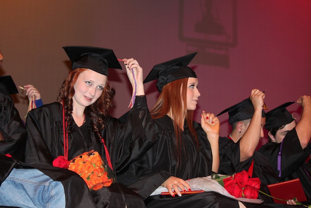 Casey Volgmann (left), who has overcome a series of major obstacles in her path to graduation, spoke during the commencement ceremony on Friday afternoon. She joins Randee Schneider and Spencer Carnera as the top three students in academic ranking in the EHS class of 2014.