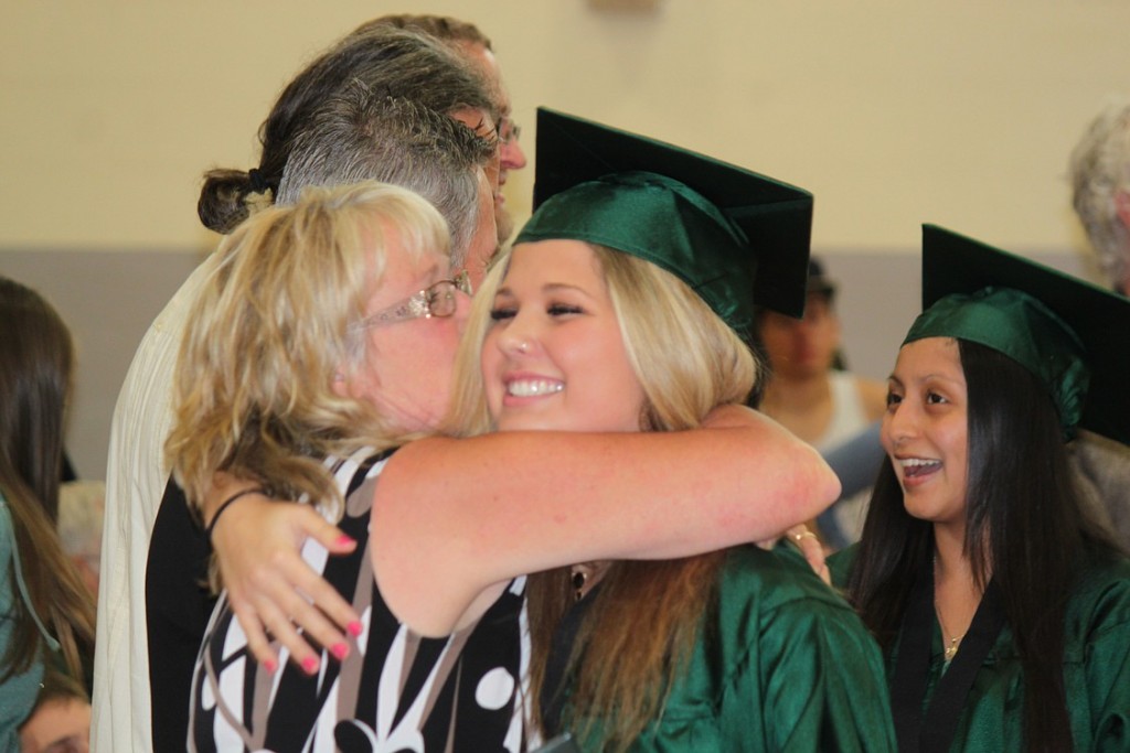 Hayes Freedom High School graduates Madison Russell  and Brenda Nesta-Serrano received congratulations from staff and Camas School District board members after receiving their diplomas on Saturday.