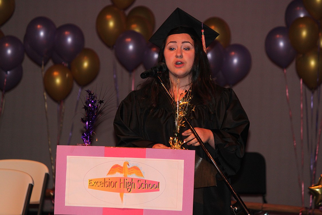 Audrey Sibley performs "When I'm Gone," during Excelsior High School graduation ceremonies at the Washburn Performing Arts Center. There were 19 students in the 2013 graduating class.