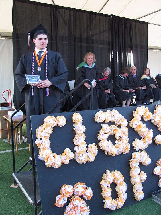 WHS graduate Anthony Valdez received the Bootstrap Award after overcoming adversity. He took care of his younger sister, while also taking Advanced Placement classes and earning a high grade point average.