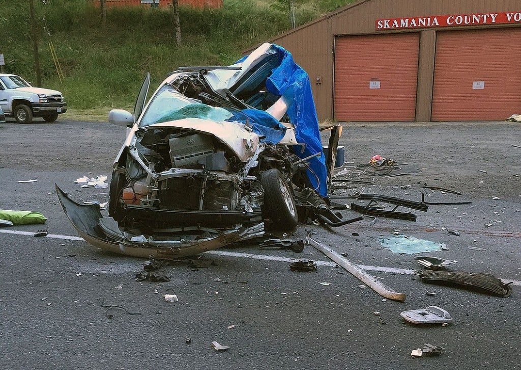 Highway 14 near milepost 33 was closed until 2 a.m. Sunday following a collision that killed three people and injured three others.