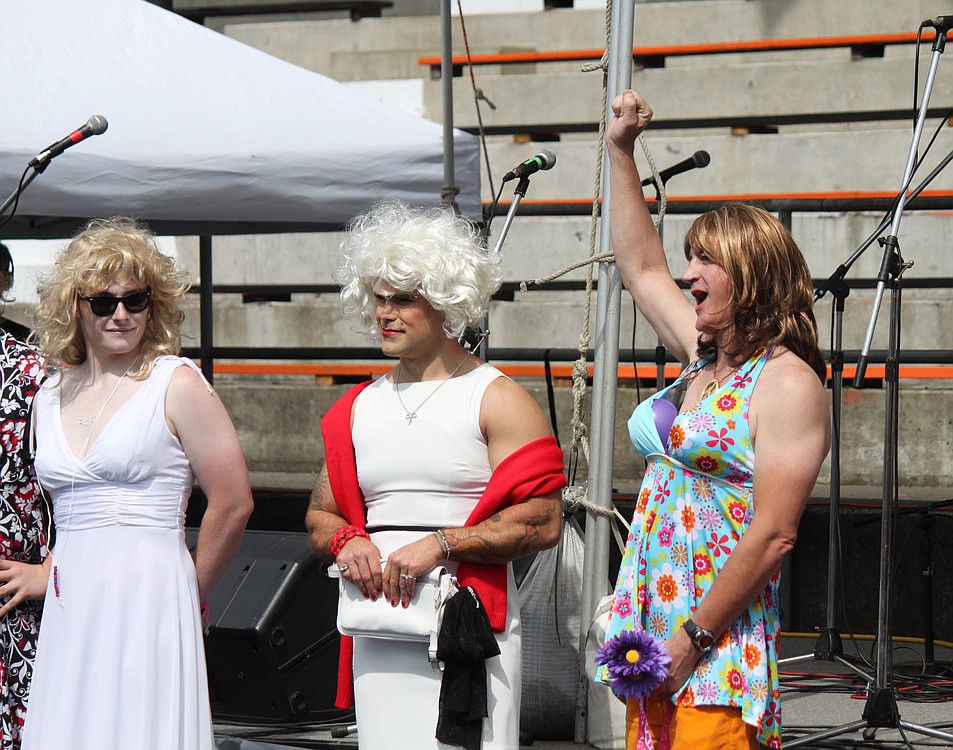 Nick Fishel (right) celebrates as he is crowned "Misster Relay," during a pageant held as part of the East Clark County Relay for Life. Fishel, of the Linda's Lazy Dazies team, was able to collect more than $500 in just 25 minutes. Also pictured are Nate McNicholas of team ROAR for Cancer and Steven Phillips of the Wayward Women of Washougal. East Clark County Relay for Life, a 24-hour fundraising event, included 31 teams that brought in more than $62,000 for the American Cancer Society.