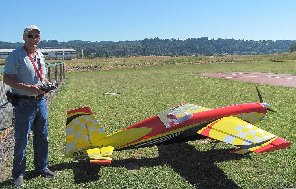 Brian Joiner prepares to fly his Pilot Extra 330 model plane on a sunny Friday morning. The Vancouver resident is the past president and current vice president of the Fern Prairie Modelers in Washougal.