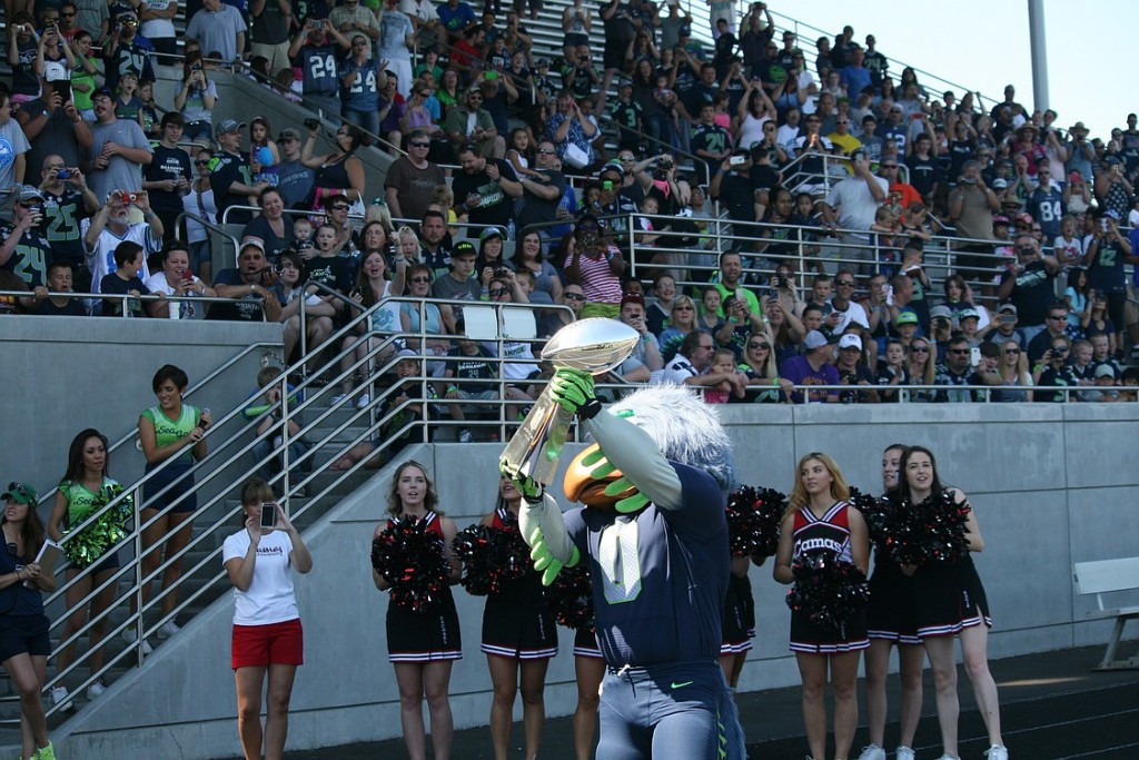 Blitz holds up the Vince Lombardi Trophy for the thousands of screaming Seahawks fans who attended the Play 60 Family Fest Saturday, in Camas.