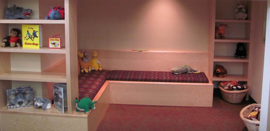 A reading nook is one of the many "little touches" at the  school. Dull Olson Weekes Architects designed it after finding out there was extra space in the library area.