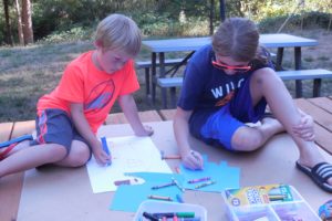 Jake and Abby Wall make posters thanking firefighters battling the 60-acre Gold Rush Fire, located approximately 12 miles northeast of Washougal. The effort was organized by Cape Horn-Skye Elementary School third-grade teacher Darcy Hickey. "There is absolutely no threat to structures in the area, including our school," she said. "But this is only because of the amazing men and women who are dedicated to fighting this fire."