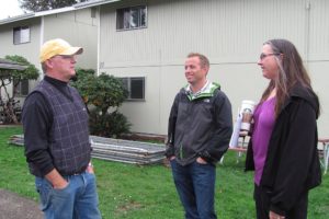 Casey Doyle, project supervisor for LMC, Inc., Ryan Duffin, project manager, and Leah Greenwood, the Affordable Community Environments housing development project manager, talked Friday about a renovation project at Towne Square Apartments in Washougal. It will include the installation of fire sprinklers in all units and the replacement of siding, windows, staircases and carpeting. Residents will temporarily relocate during the renovations.