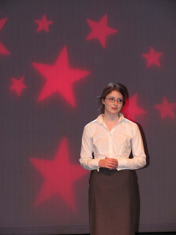 Narrator Shannon Leininger begins "44 Plays for 44 Presidents," during a rehearsal at Washburn Performing Arts Center last week.
