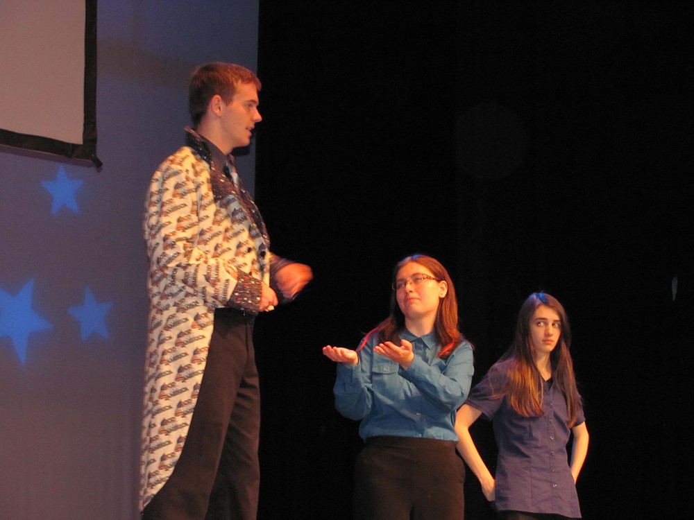 President John  Adams (Mac Wright) speaks with Thomas Jefferson (Miranda Sutton) and James Madison (Michaela Gerring) about the future of the country.