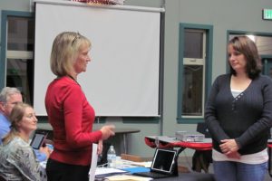 Dawn Tarzian (left), Washougal School District superintendent, administers the oath of office to Jocelyn Lindsay, while board members Elaine Pfeifer and Blaine Peterson look on. Lindsay will fill the term left when Terrie Hutchins moved out of her director district.