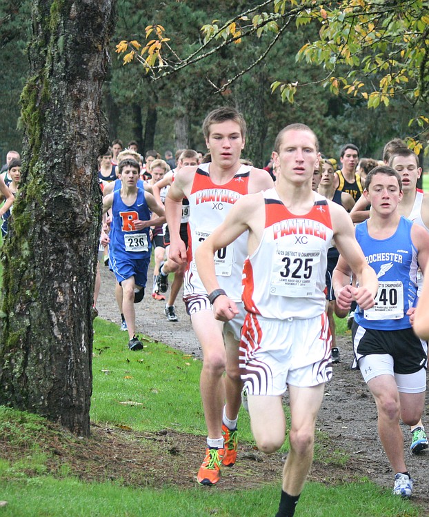 Bailey Duncan and Aiden Pullen stick together for the Panthers during the 2A district boys cross country race. Duncan earned 11th place and Pullen placed 13th to qualify for state.
