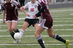 Rachel Gibson (16) takes a shot at the net for the Camas High School girls soccer team. The Papermakers played their hearts out in the first round of state Nov. 8, at Doc Harris Stadium, but lost to Shorecrest in a shootout.