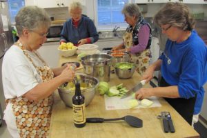 Judie Frederick, Marieta Schreiner, Maria Perez and Vickie Oates (left to right) prepared vegetable beef barley soup Nov. 10, at the Lost and Found Cafe, in Camas. They plan to retire from volunteering at the cafe, after December. Nancy Wilson, executive director of the Inter-Faith Treasure House, is seeking individuals who can cook dinner for 50 to 60 people, on the second Monday of the month, at Zion Lutheran Church.