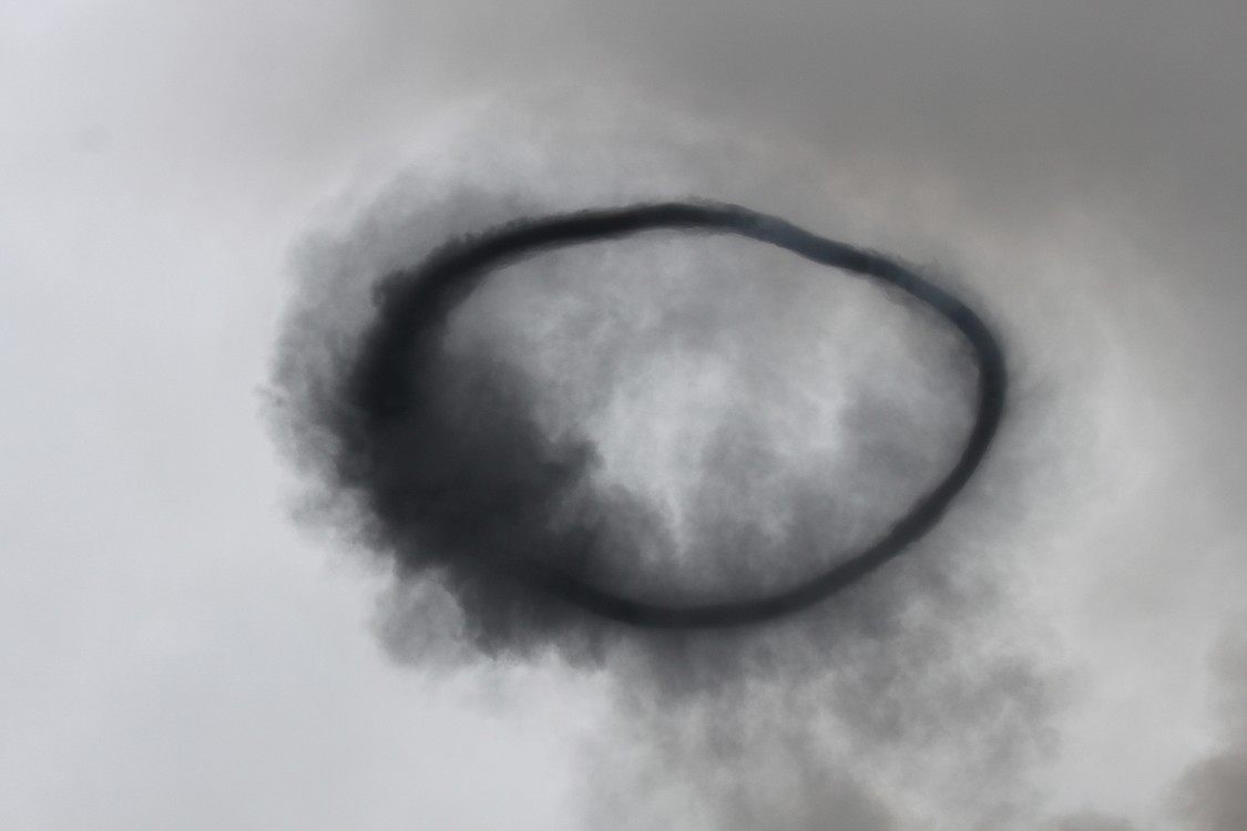 A huge ring of smoke was created following a fiery explosion that occurred during Wednesday's house fire and standoff in Washougal.