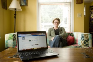 Eileen Cowen, shown, Monday, March 19, 2012, moderates her neighborhood's Facebook page from her Hough area home. (Steven Lane/The Columbian)