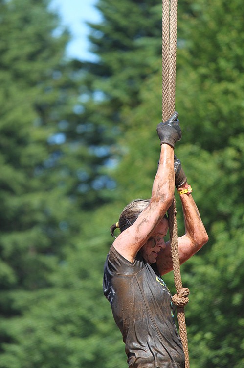 The rope climb obstacle was reportedly among the most challenging aspects of the grueling race. Those who were not able to claw, grab and hoist themselves to the top and ring a bell were required to do 30 burpees --a cross between a jumping Jack and a push-up. The race also included obstacles such as carrying sandbags and bricks, throwing a javelin, climbing up walls, and tipping over tractor tires.