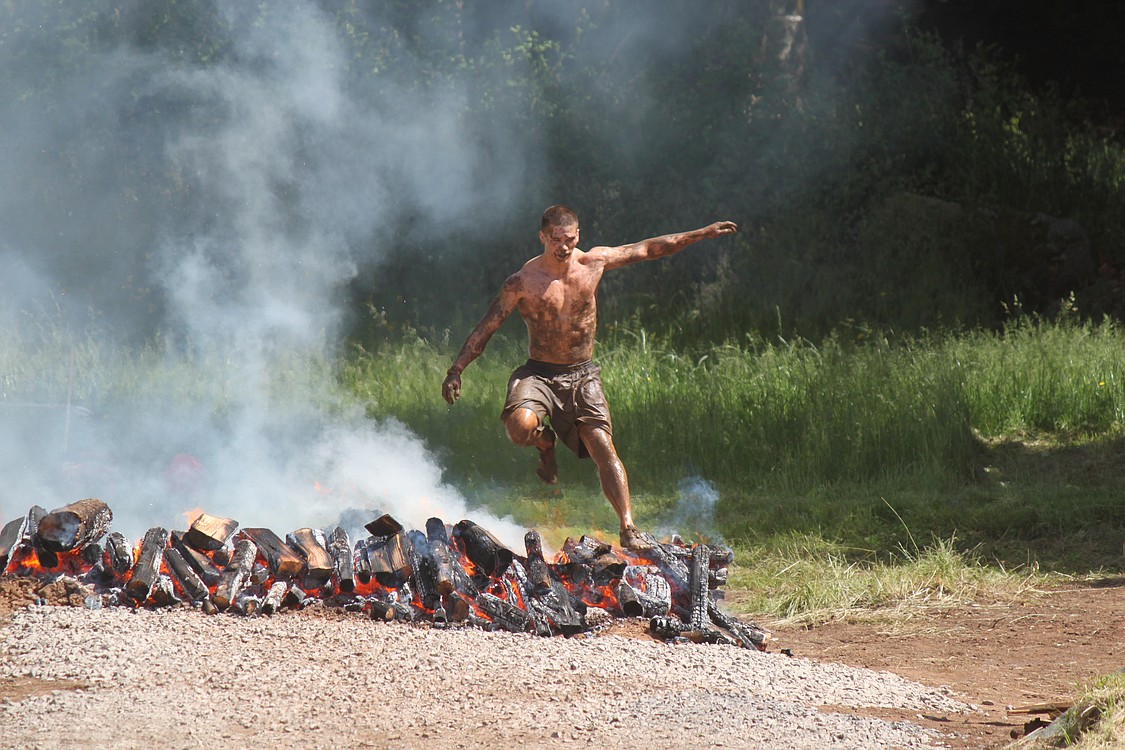 Spartan Race, held at the Washougal Motocross Park on Saturday, included a fire pit obstacle, which came near the end of the 4 mile course.