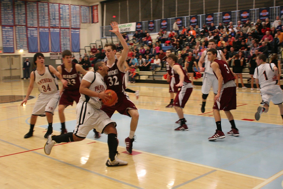 Mustapha Bah bowls through the defense to score two points.
