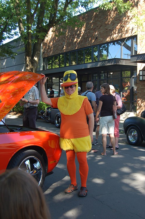 Rotarian Steve Hogan dressed up in a duck costume for the Camas Car Show in honor of the 2011 Ducky Derby scheduled for Sunday, July 24. The annual Rotary Club fundraiser raises money for scholarships for college bound high school seniors.