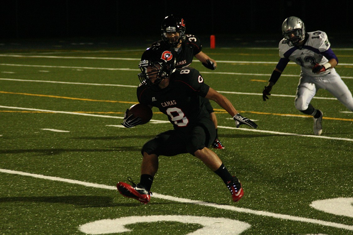 Miguel Salamanca shows off his speed and agaility for the Camas High School football team Oct. 15, at Doc Harris Stadium.